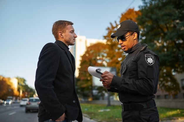 A police officer talking to a community member during a neighborhood event.