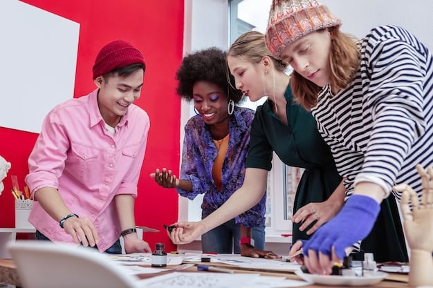 A group of young adults participating in a vocational training program in a developing nation, learning skills in technology and entrepreneurship, supported by US foreign aid.