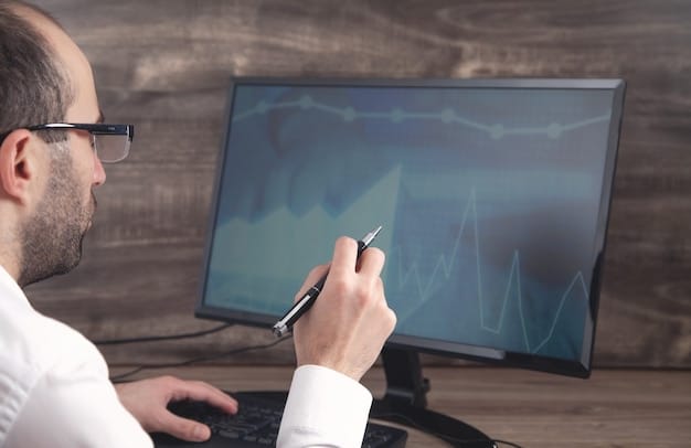 A researcher analyzing data on a computer screen, with graphs and charts displaying statistics related to gun violence incidents and intervention outcomes.
