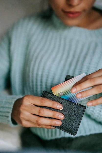 A hand carefully placing a credit card back into a wallet, emphasizing the importance of securing your financial cards. The wallet is inside a closed handbag, further reinforcing the concept of protecting personal belongings.
